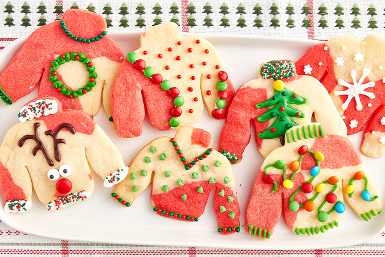 Sugar cookies decorated as ugly christmas sweater